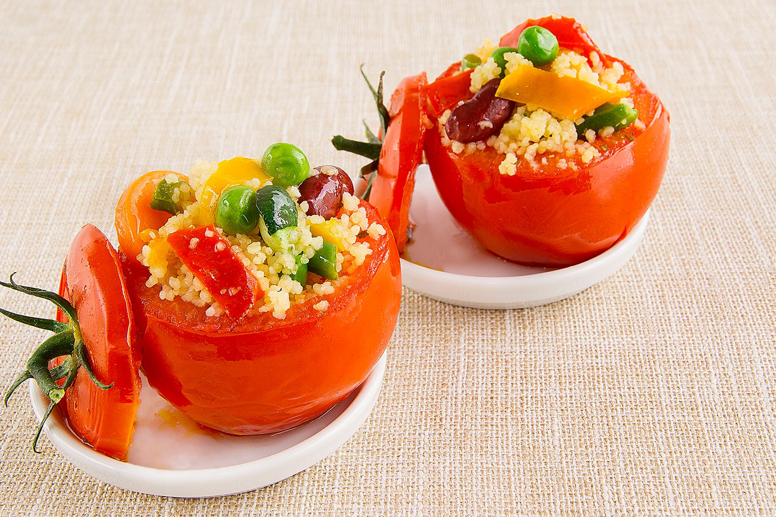 Oven baked tomatoes stuffed with veggie cous-cous